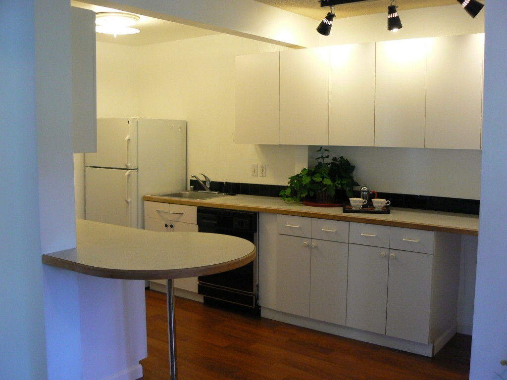 Property Photo:  4815 180th St W L204  WA 98036 
