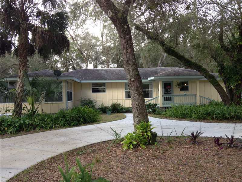 Property Photo:  8597 SW Riverside Drive  FL 34269 