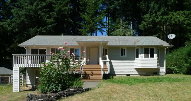 Property Photo:  111 NE Schooner Lp  WA 98528 