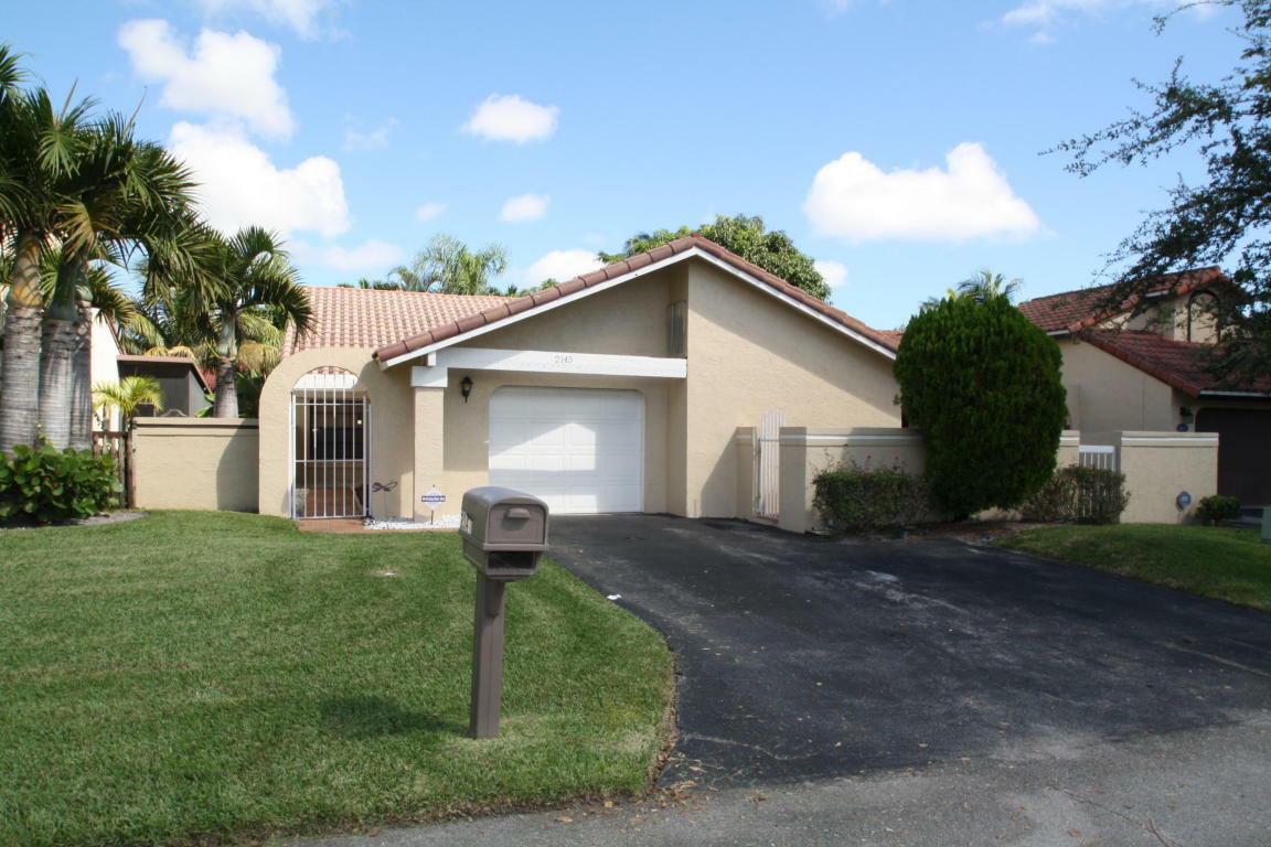 Property Photo:  2145 NW 14th Street  FL 33445 