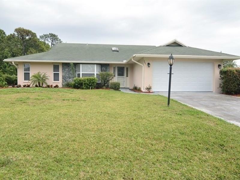 Property Photo:  2441 SW Avondale Street  FL 34984 