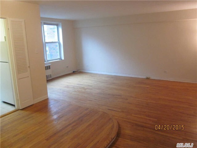 Property Photo: 65-65 Wetherole St 2J NY 11374
