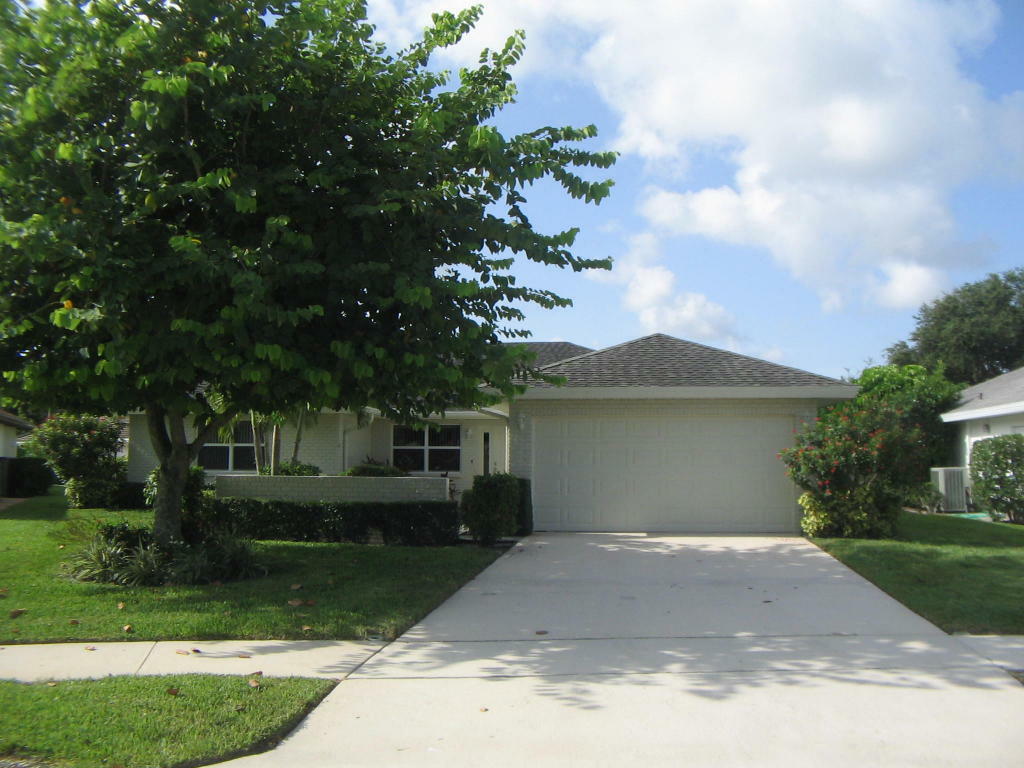 Property Photo:  10716 Greentrail Drive  FL 33436 