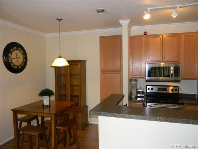 Property Photo:  4451 South Ammons Street Unit 5-206  CO 80123 