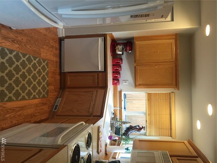 Property Photo:  114 119 Dr SE  WA 98258 