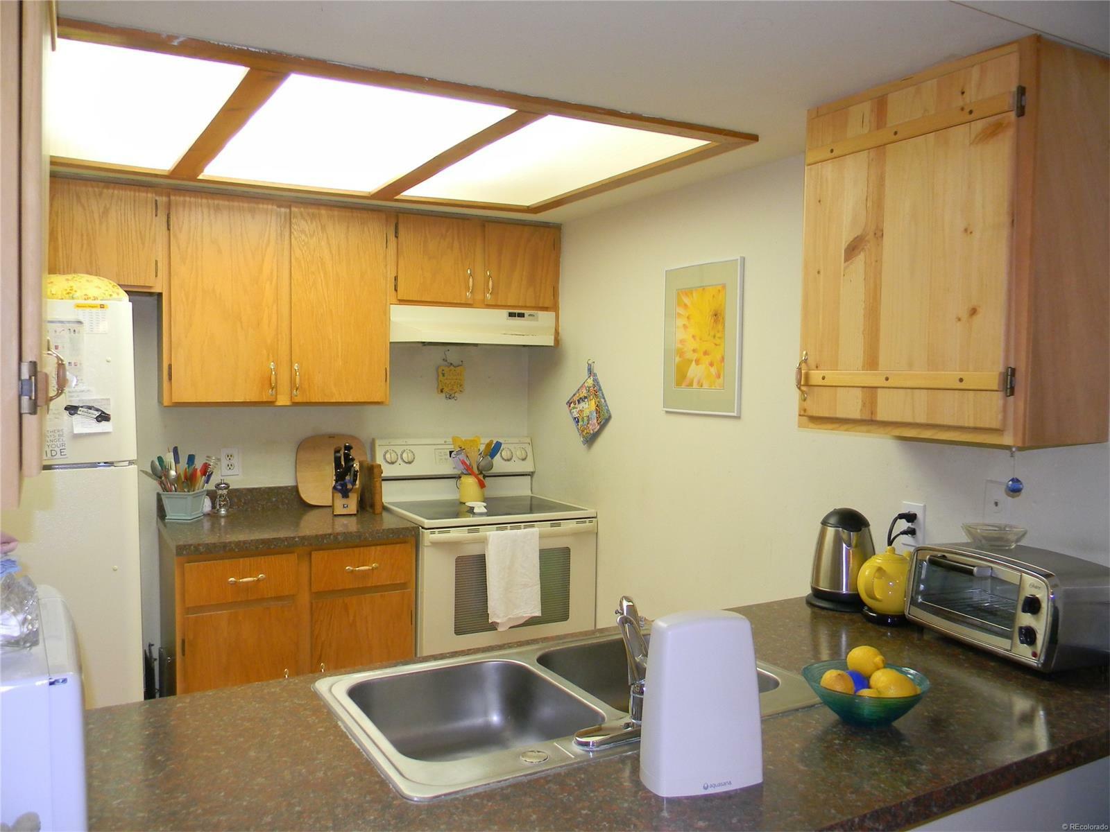 Property Photo:  4866 South Dudley Street Unit 1-5  CO 80123 