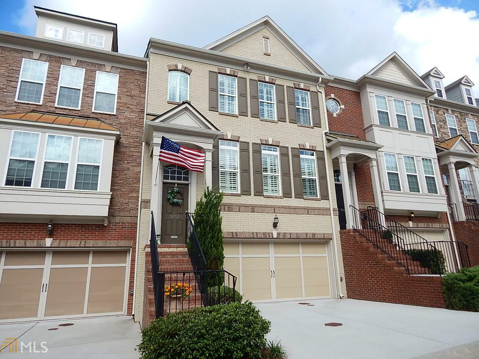 Property Photo: 5052 Ridgemont Walk SE GA 30339-9012