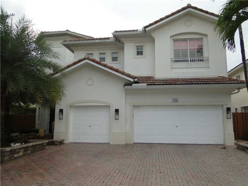 Property Photo: 7044 NW 113th Pl FL 33178