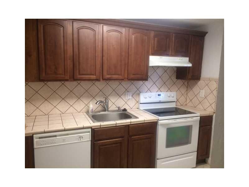 Property Photo:  3195 Foxcroft Rd F211  FL 33025 