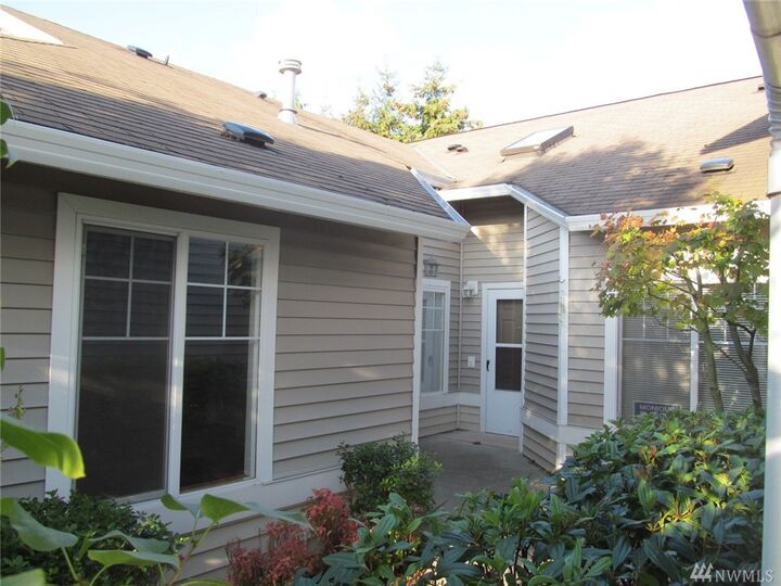 Property Photo:  6106 Nathan Wy SE C  WA 98092 