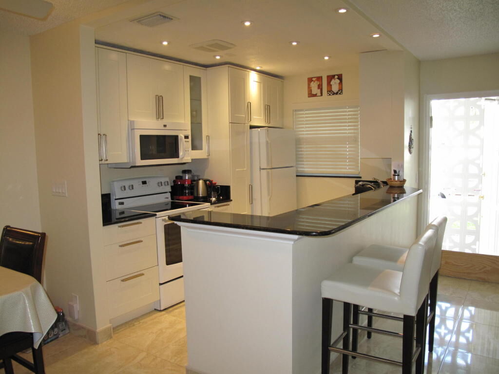 Property Photo: 1192 S Drive Circle A FL 33445