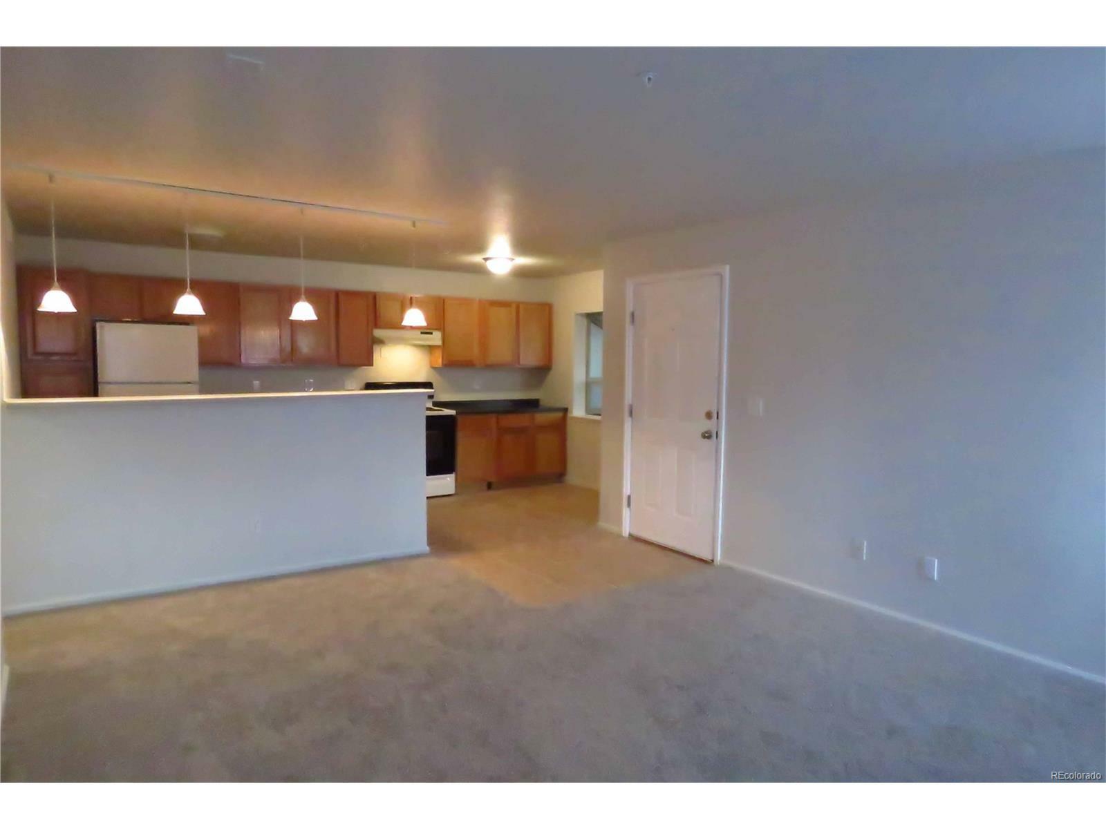 Property Photo:  8740 Corona Street Unit 103  CO 80229 