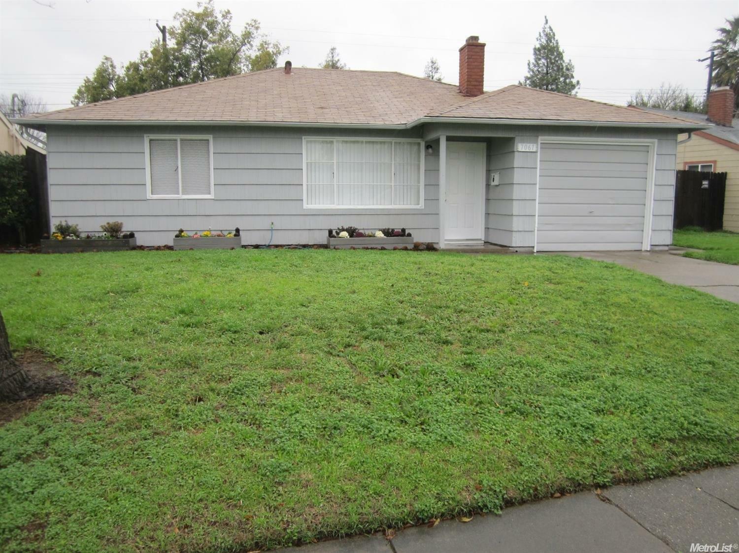 Property Photo:  7061 Alcott Drive  CA 95820 