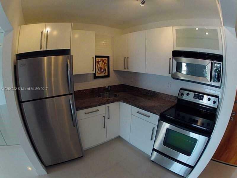 Property Photo:  237 SW 13th St 409  FL 33130 