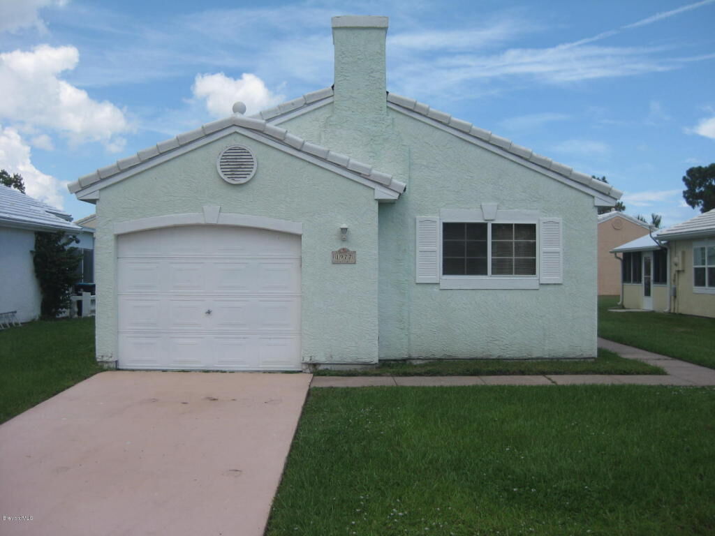 Property Photo: 1977 Sugarberry Court NE FL 32905