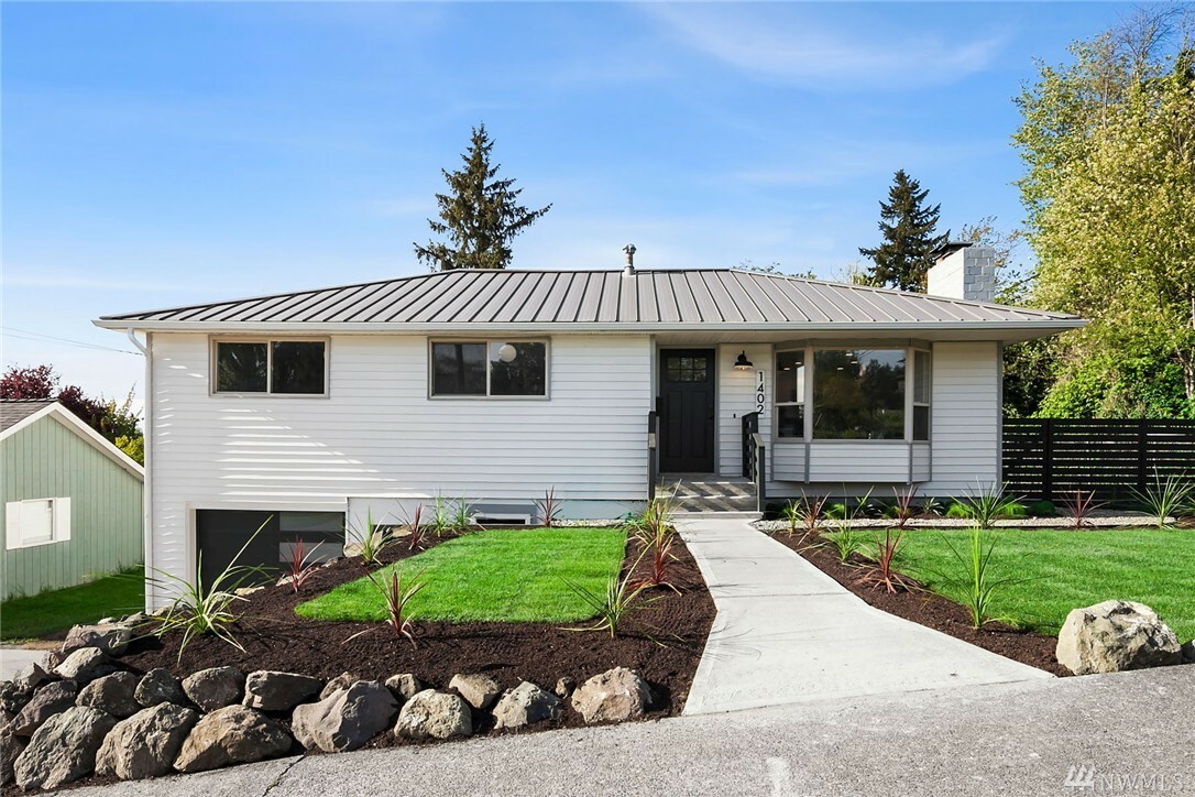 Property Photo:  1402 SW Cloverdale St  WA 98106 