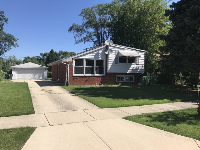 Property Photo:  7440 Emerson Street  IL 60053 