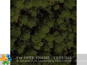 Property Photo:  6055 NW 71 Ter  FL 33067 