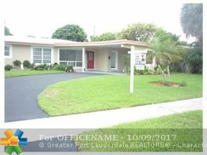 Property Photo:  2180 NE 61st Ct  FL 33308 