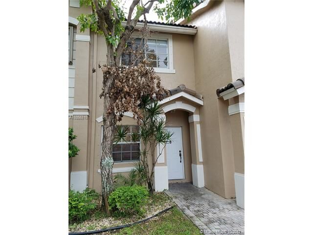 Property Photo:  5725 NW 114th Path 112  FL 33178 