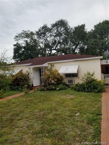 Property Photo:  960 NE 129th St  FL 33161 