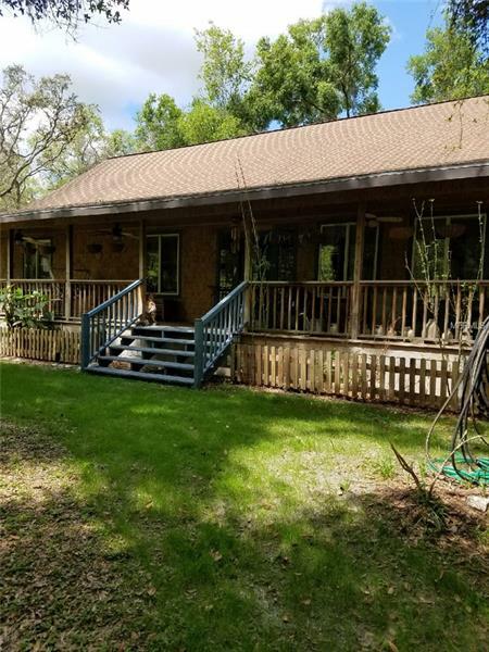 Property Photo:  12000 Canopy Oaks Road  FL 34601 