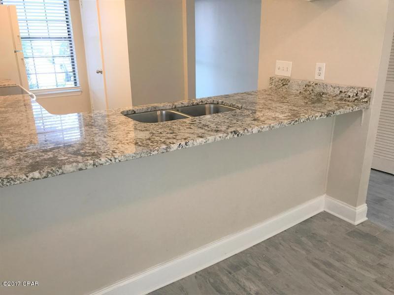 Property Photo: 7813 N Lagoon Drive 3B FL 32408