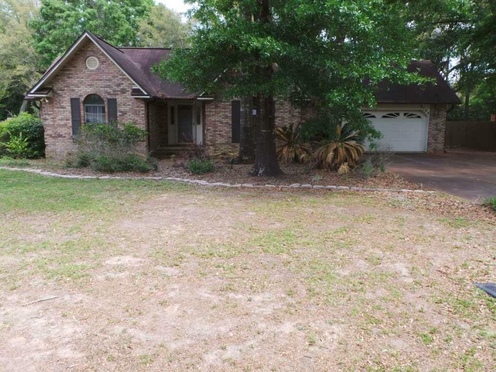 Property Photo:  6108 Arnies Way  FL 32570 