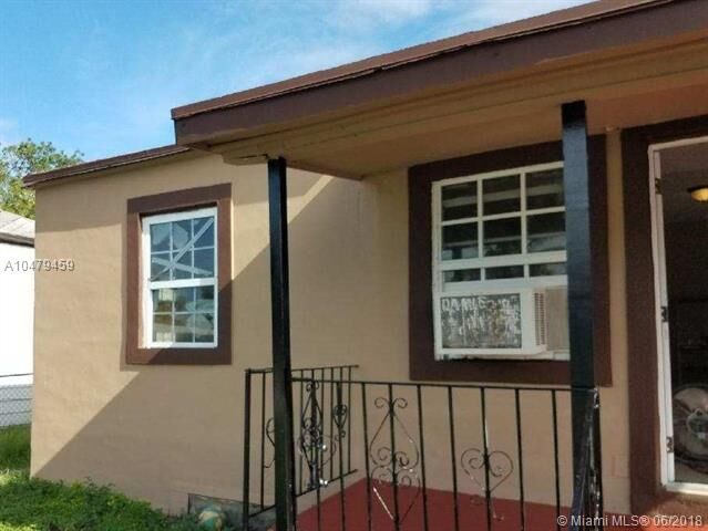 Property Photo: 900 NW 65th St FL 33150