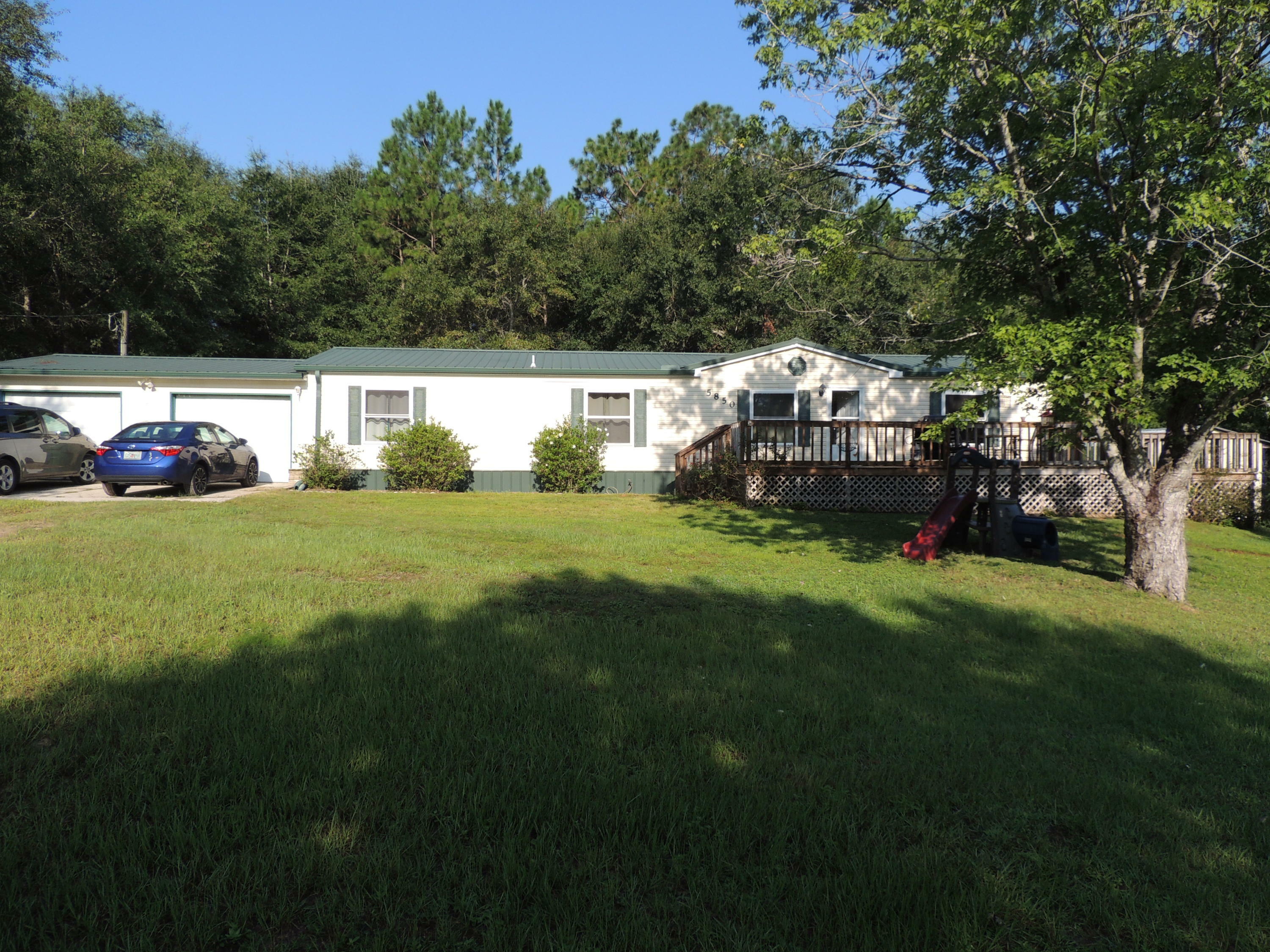 Property Photo:  5850 G. I. Trail  FL 32539 