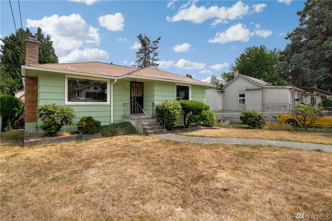 Property Photo:  5526 33rd Ave S  WA 98118 