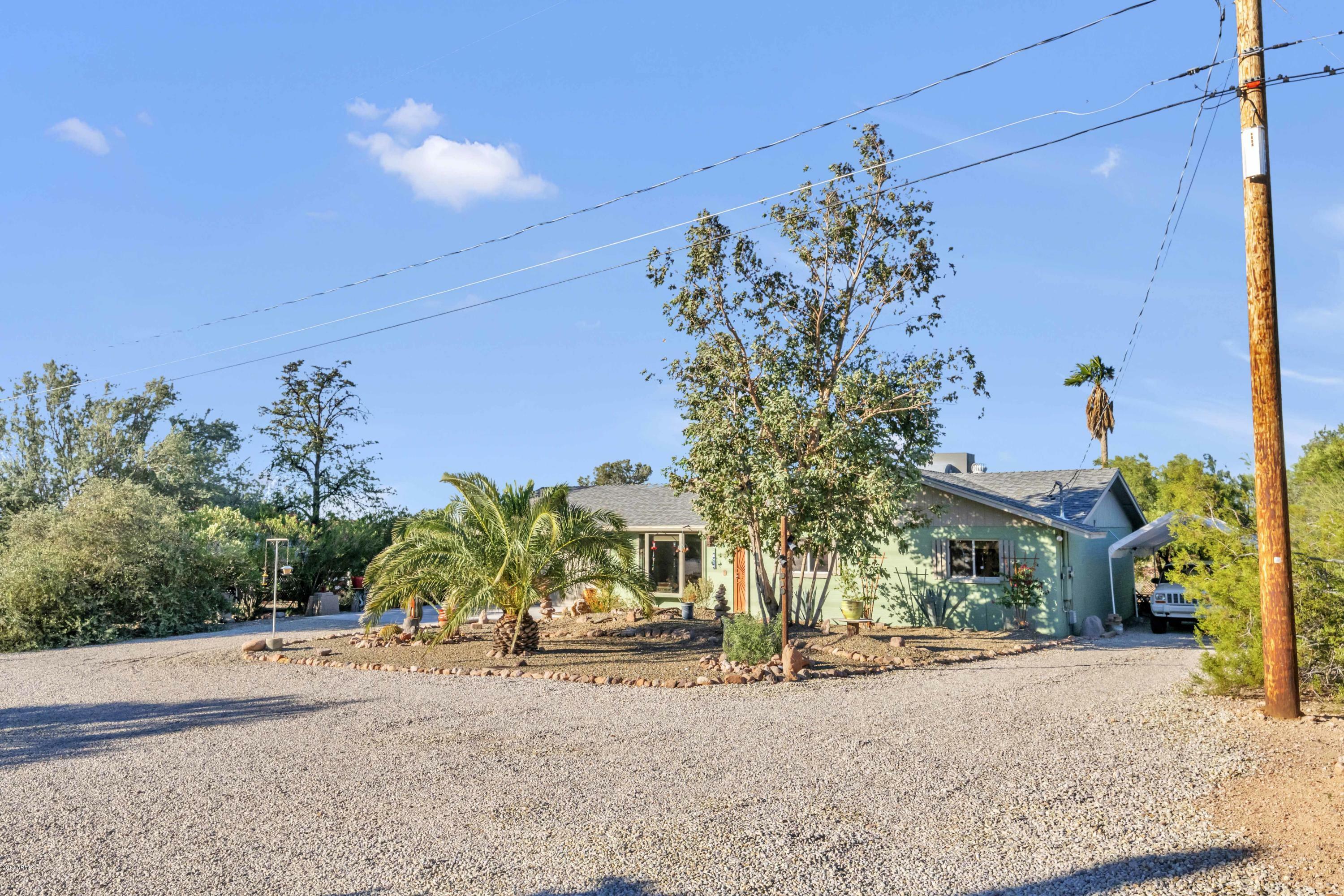 Property Photo:  2874 N Sixshooter Road  AZ 85119 