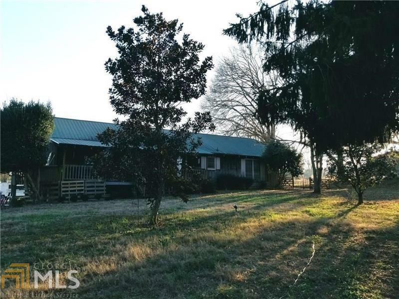 Property Photo:  8705 Nicholson Rd  GA 30028 