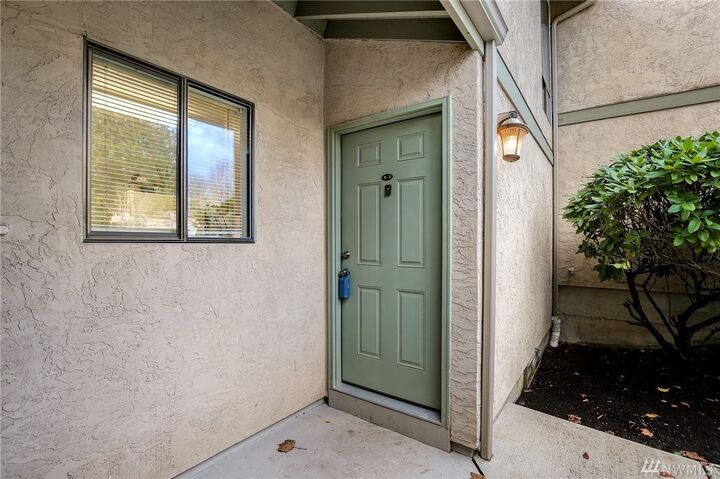 Property Photo:  10017 NE 138th B5  WA 98034 