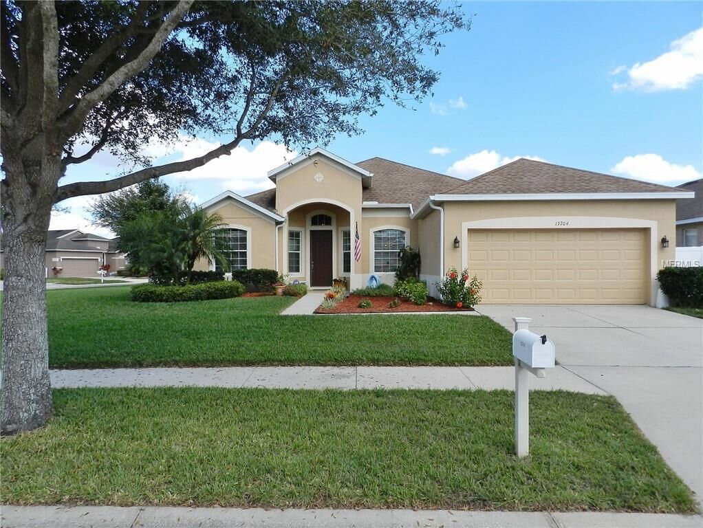Property Photo:  13704 Sanford Hill Place  FL 33579 