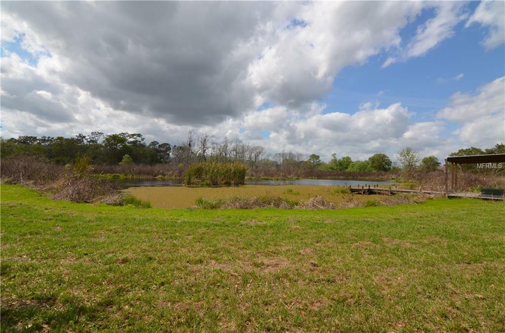 Property Photo:  7411 Groveland Farms Road  FL 34736 