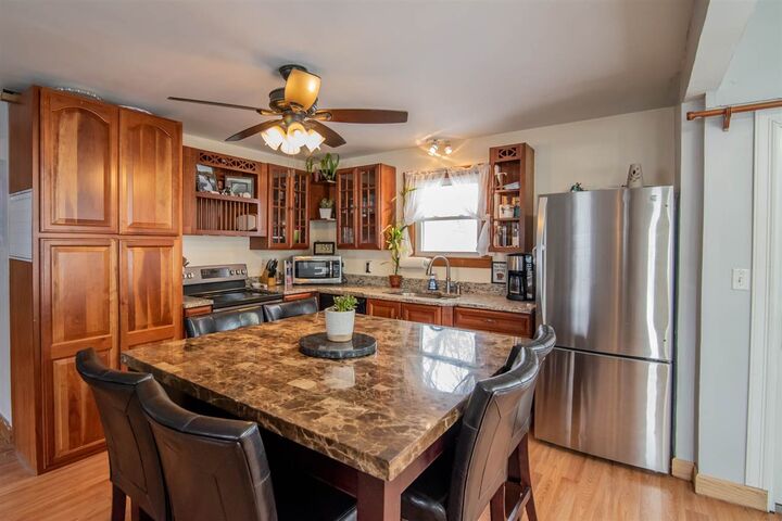 Property Photo:  884 Dix Street  NH 03103 