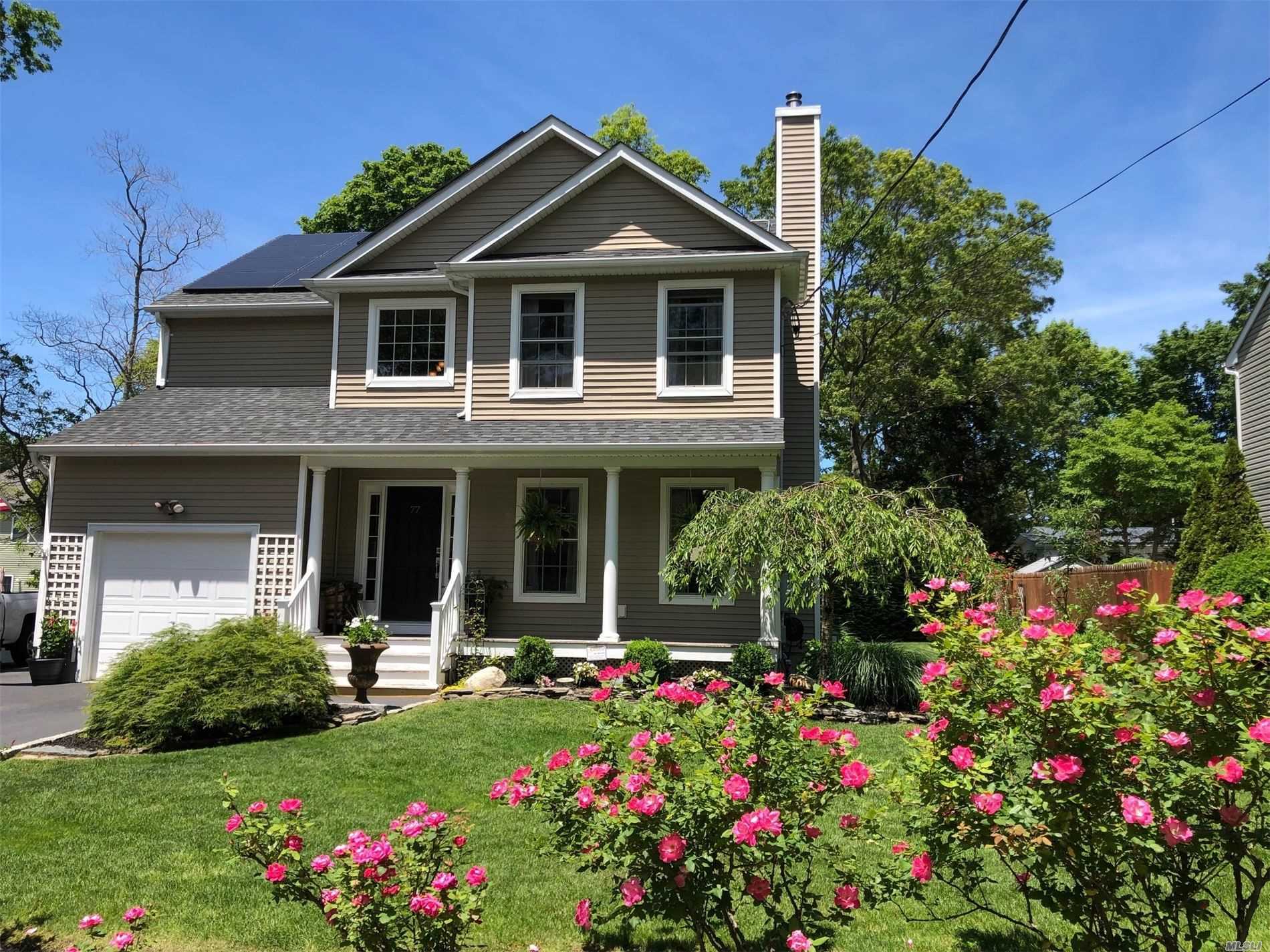 Property Photo:  77 Maple Road  NY 11778 