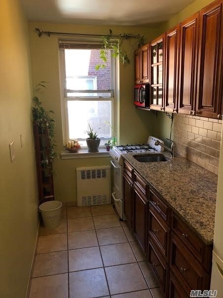 Property Photo: 102-55 67 Drive 6L NY 11375