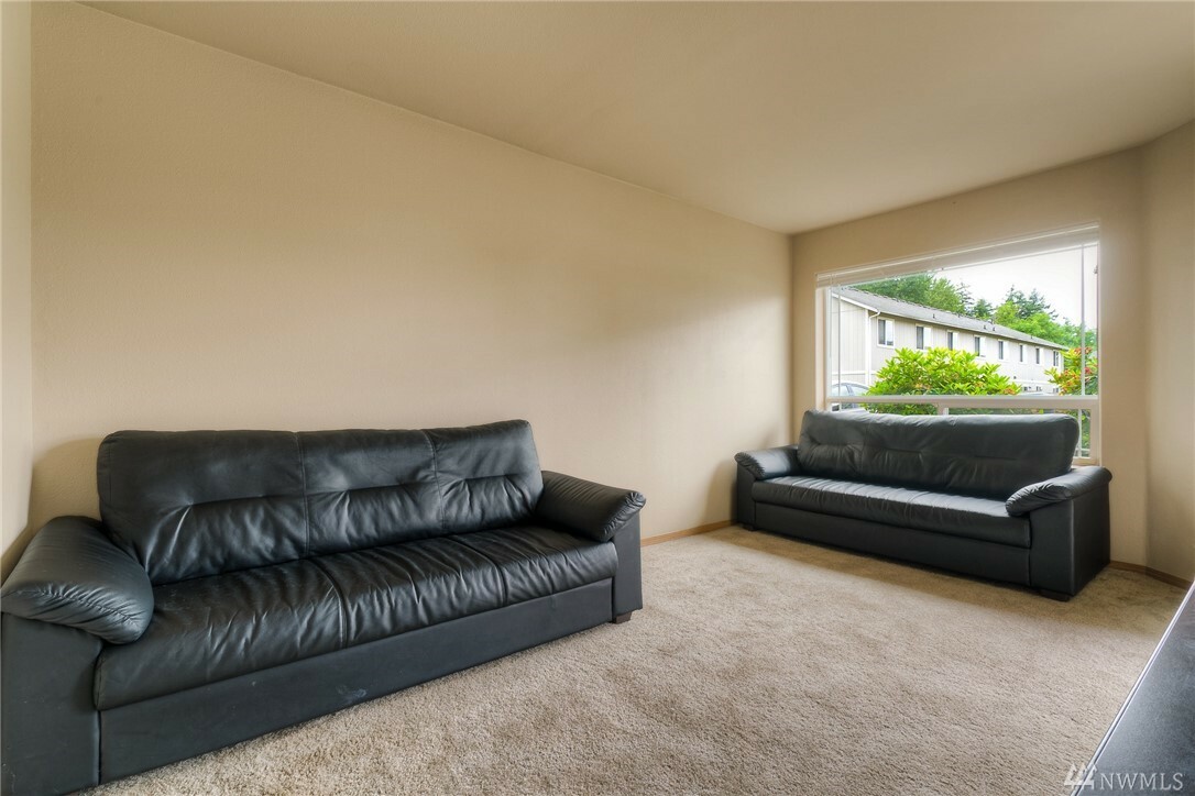 Property Photo: 10915 13th Ave E 16 WA 98445