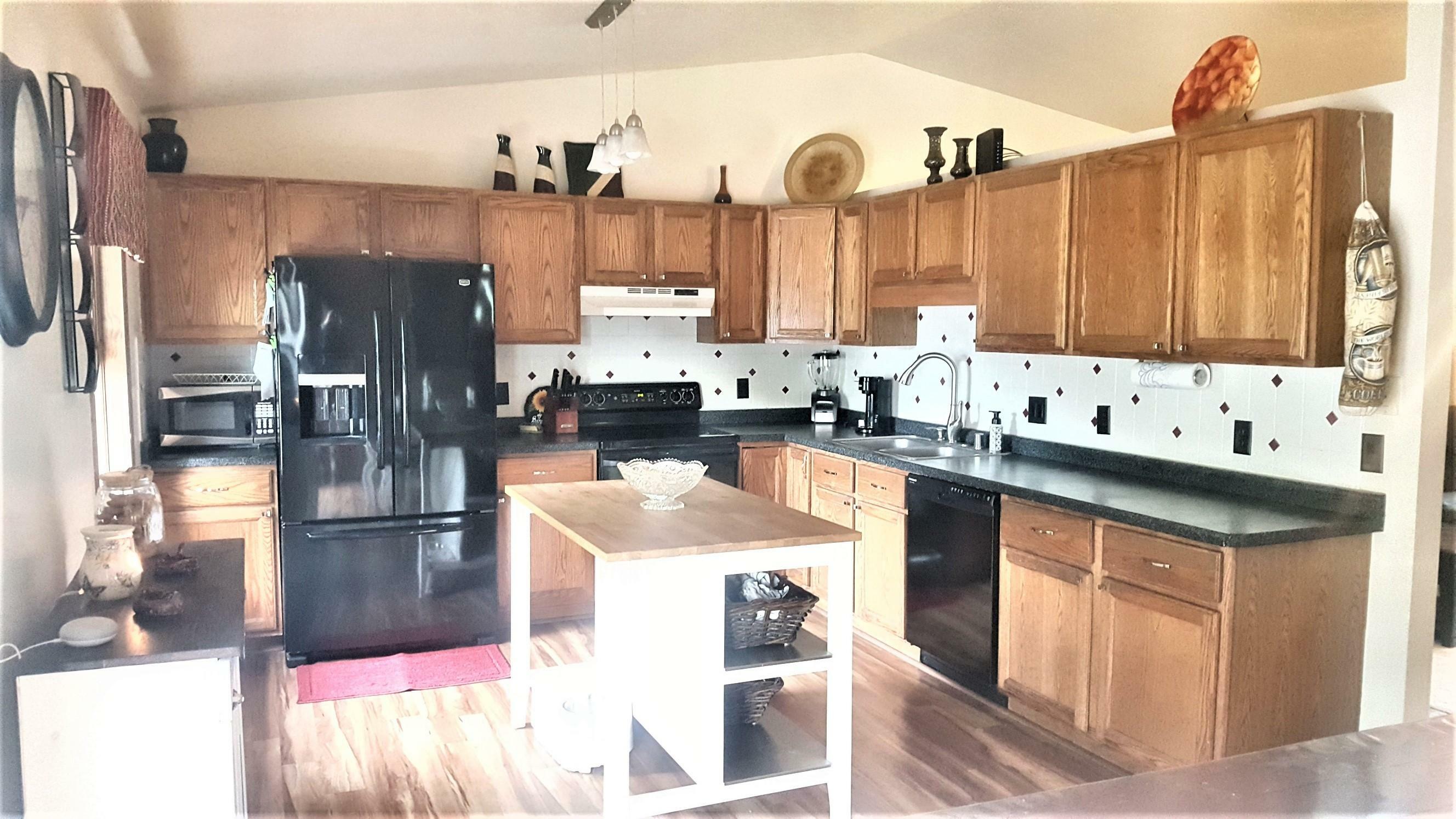 Property Photo: 619 Winson Dr WI 53185