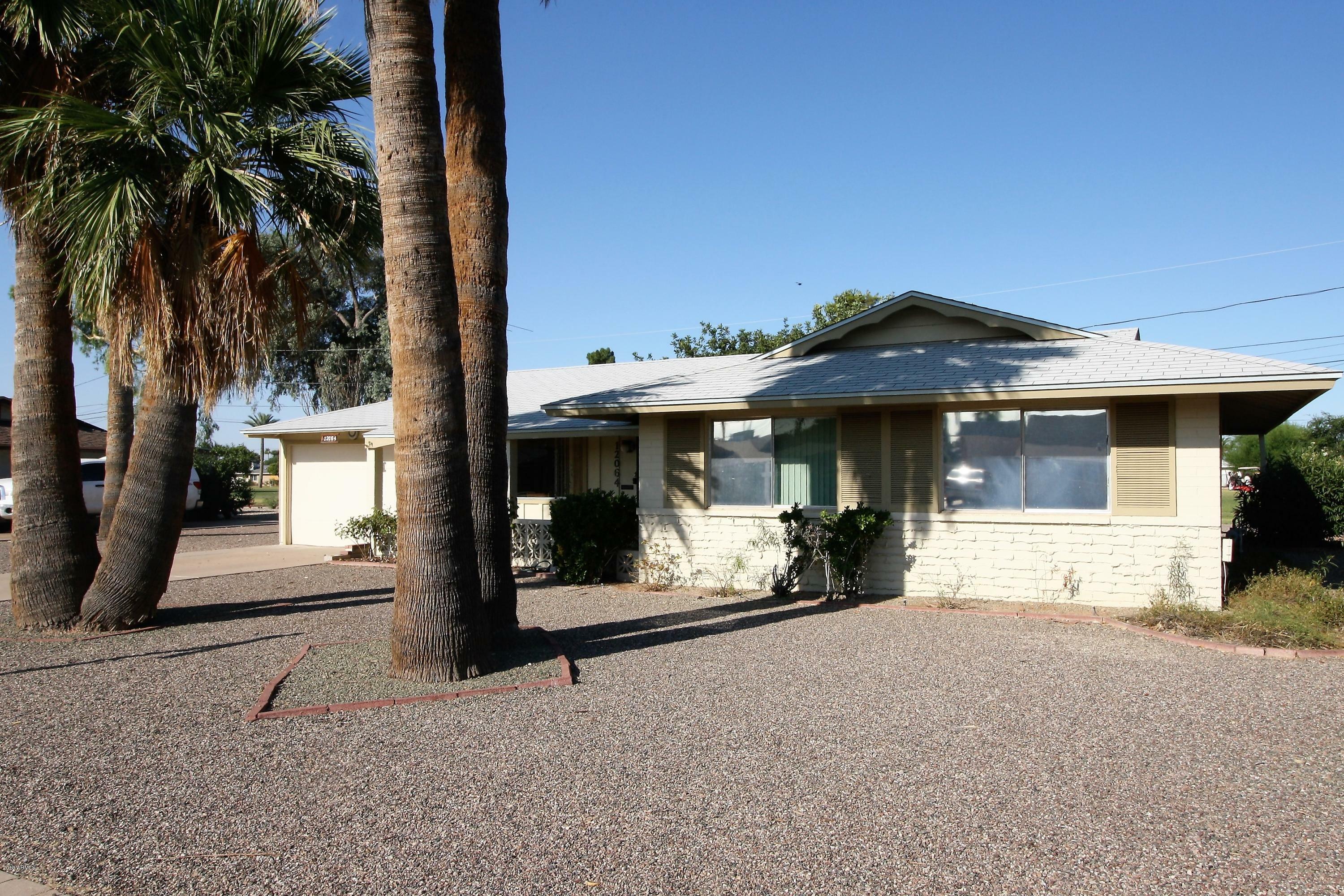 Property Photo: 12064 N Pebble Beach Drive AZ 85351