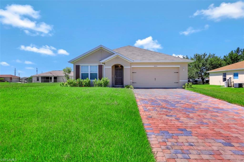 Property Photo:  2420 NW 9th Street  FL 33993 