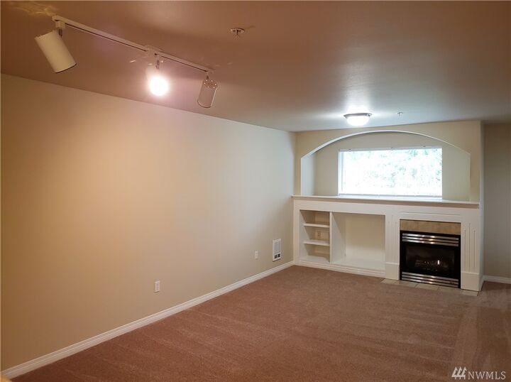 Property Photo:  15611 18th Ave W G103  WA 98087 