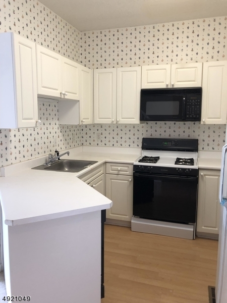 Property Photo:  8018 Brittany Dr  NJ 07470 