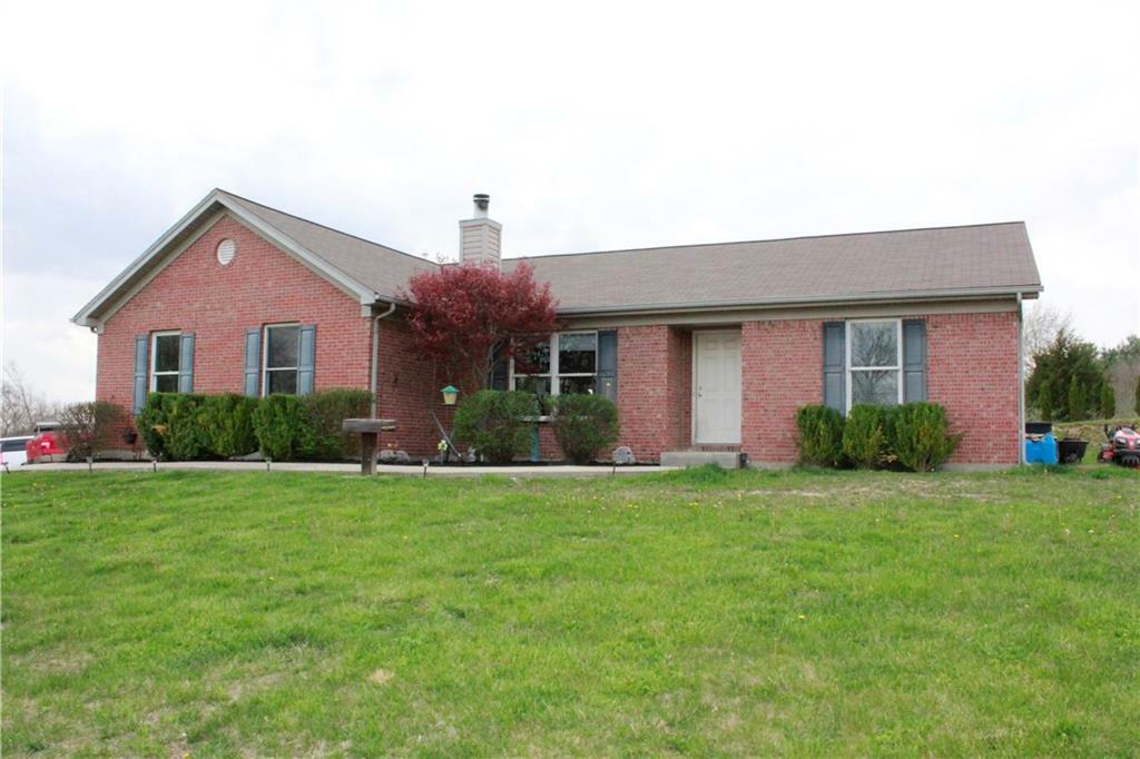 Property Photo:  7218 New Carlisle Pike  OH 45504 