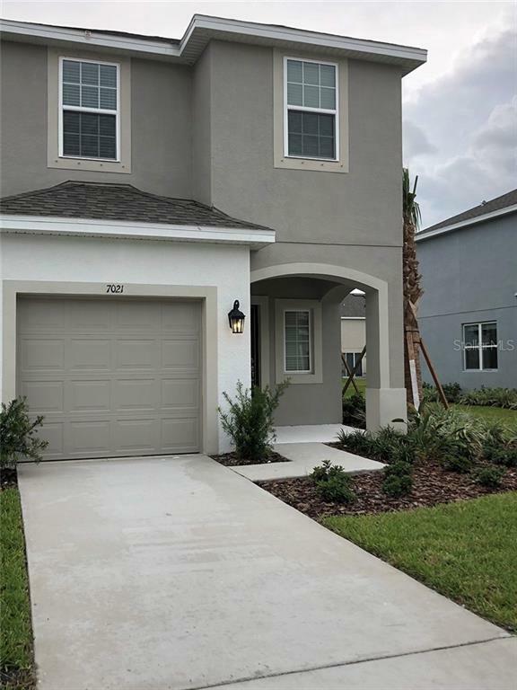 Property Photo: 7021 Grand Elm Drive FL 33578