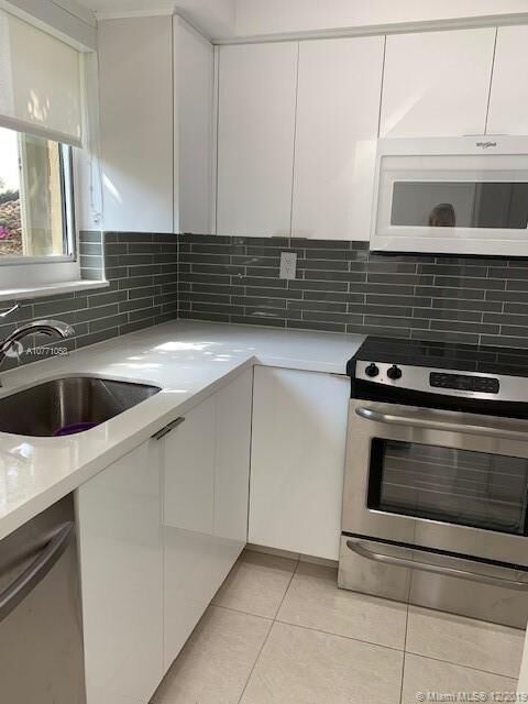 Property Photo:  20440 NE 34th Ct 14  FL 33180 