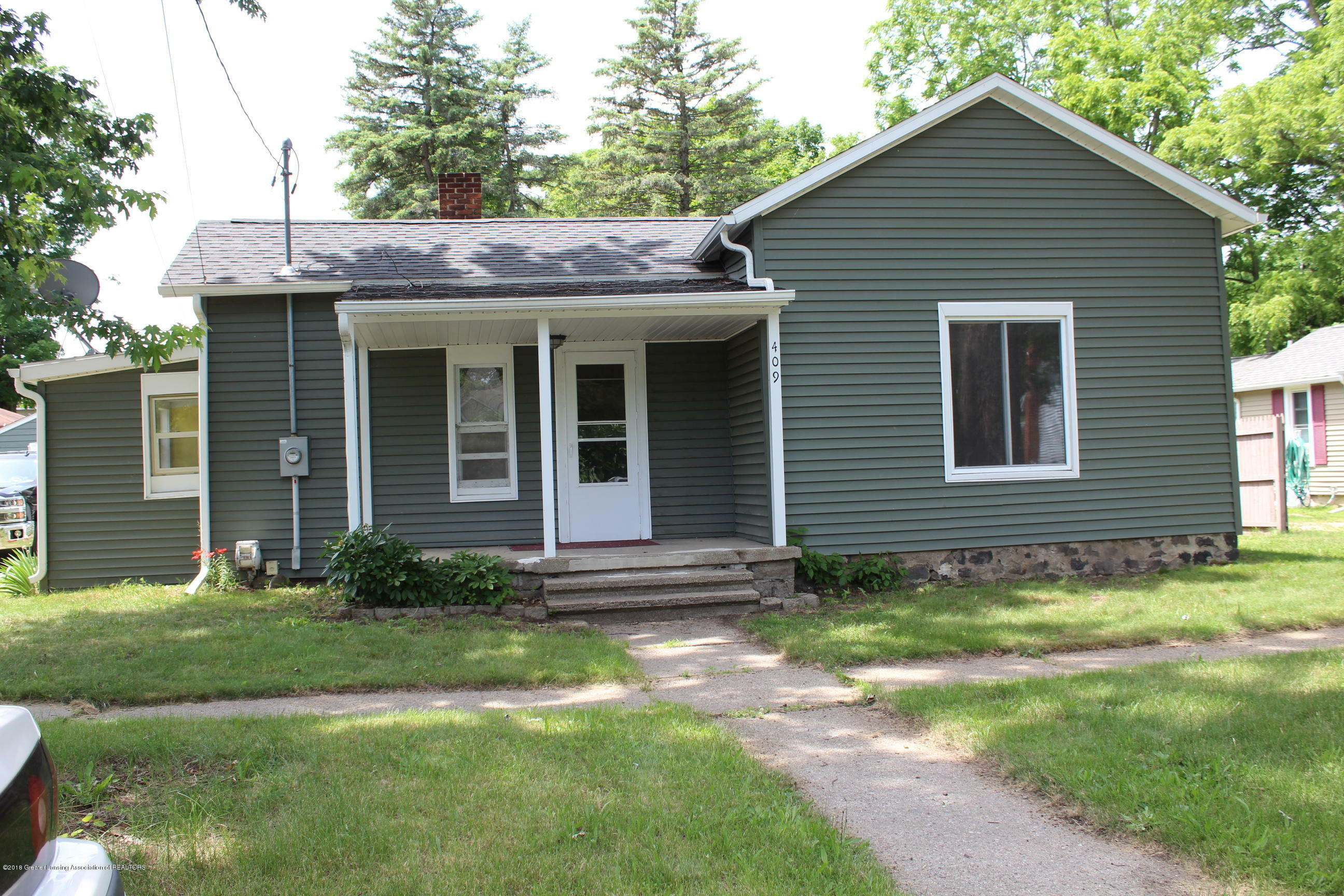 Property Photo:  409 Minerva Street  MI 48827 