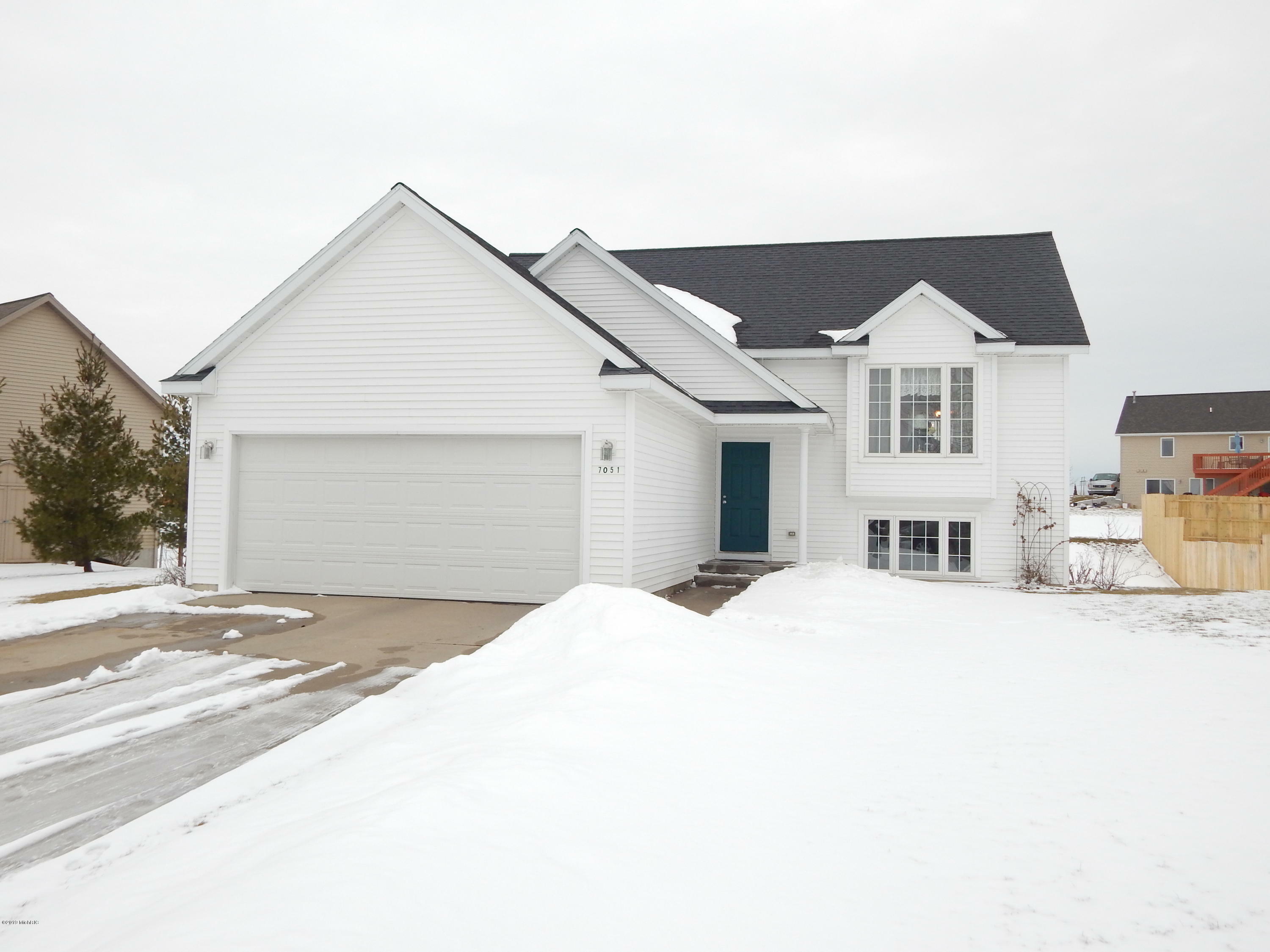 Property Photo: 7051 Shady Knoll Drive SE MI 49316